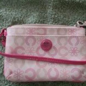 Coach small pink and cream wristlet